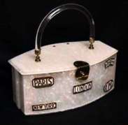 Dorset Rex Fifth Avenue Lucite Purse with Brass Enameled Travel Emblems